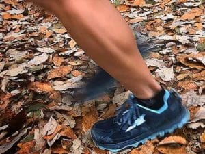 Altra 4.5 trail running show on a leafy trail.