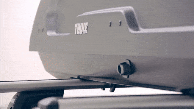 Using Thule's LockKnob to unlock and open the Thule Force XT roof-top cargo box
