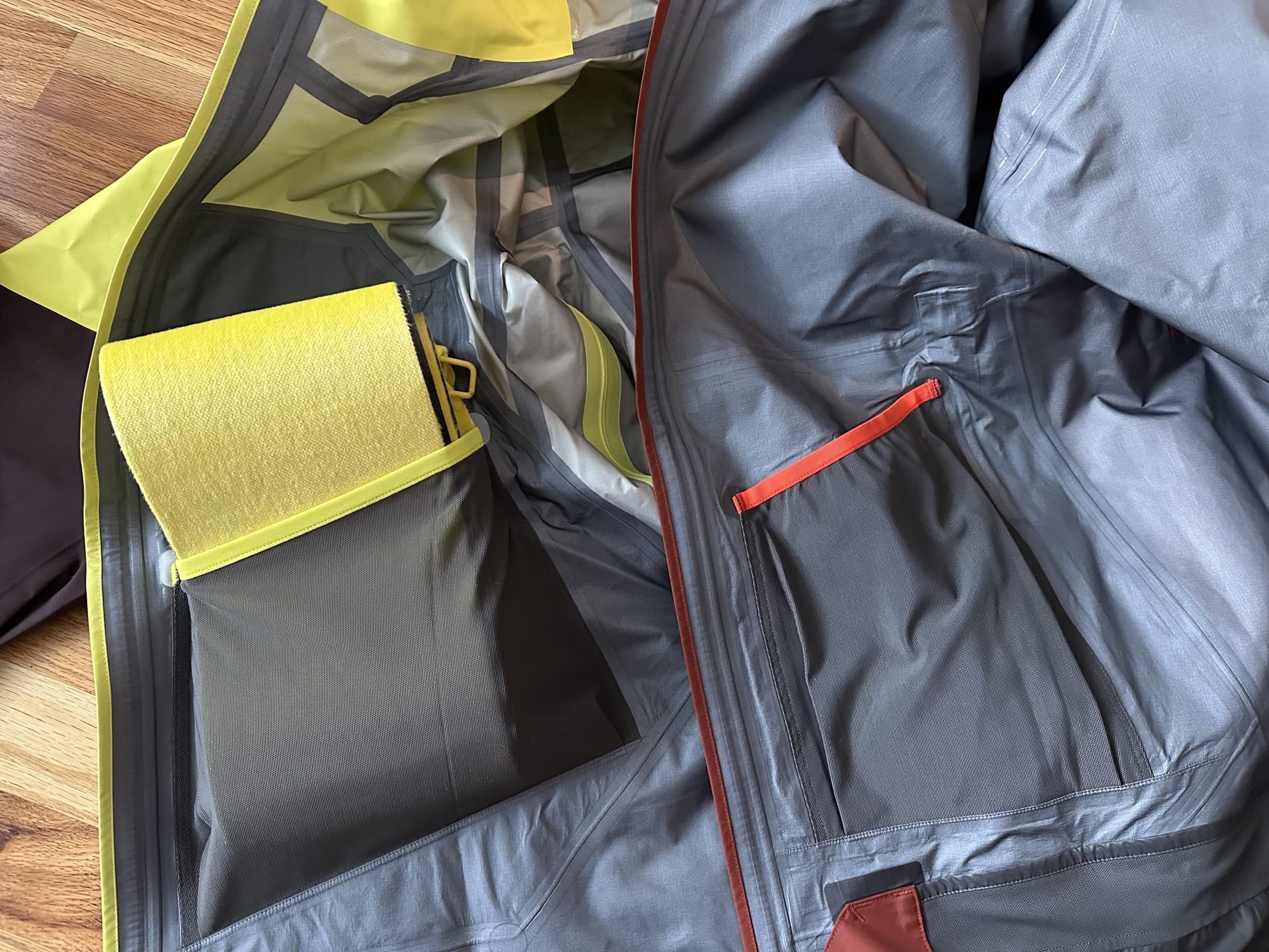 A comparison of the dump pockets in the Arc'teryx Rush and Sabre SV ski jackets