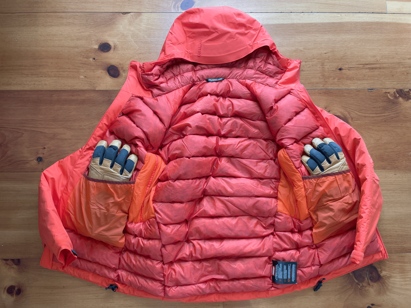 The interior of the Arc'teryx Beta Down Insulated jacket showing the pockets.