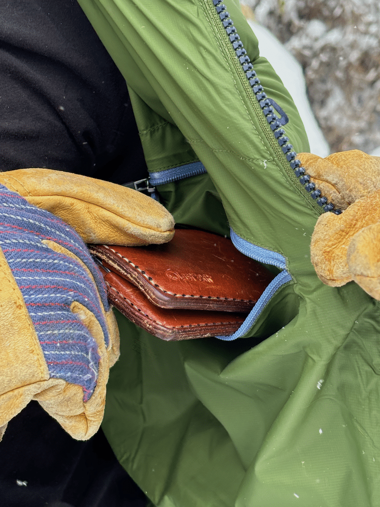 Image of the interior chest pocket on the Stio Hometown Down hooded jacket.