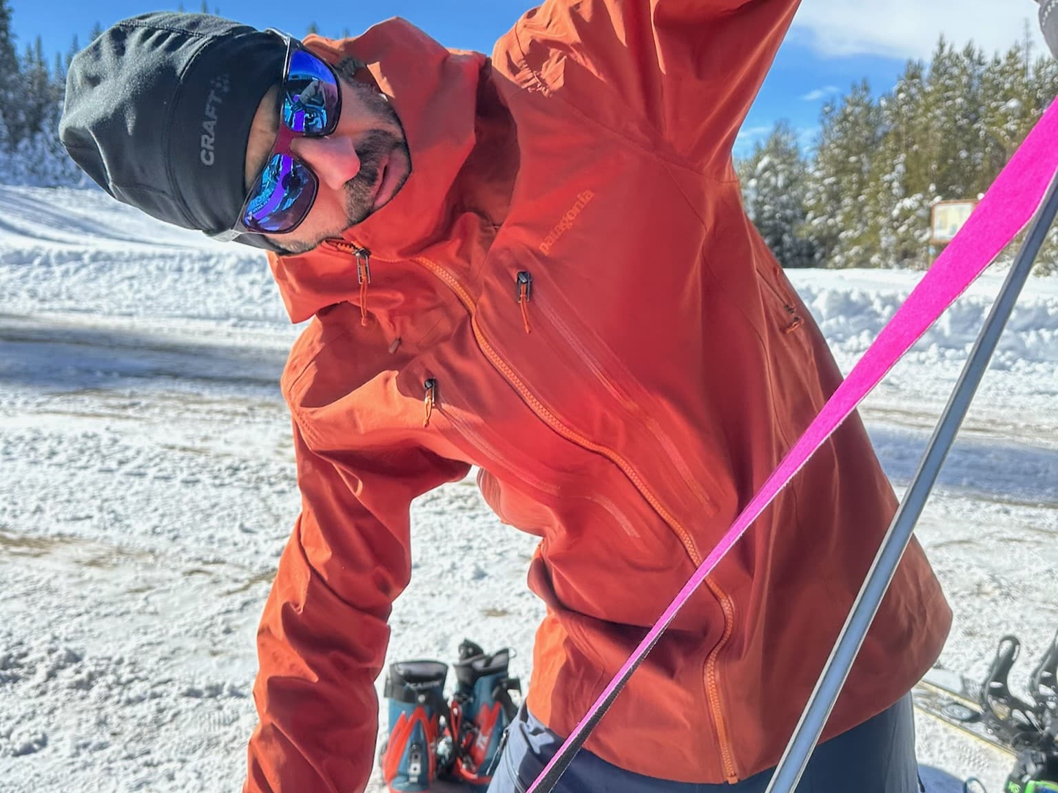 Wearing the Patagonia Stormstride jacket while getting ready to ski.