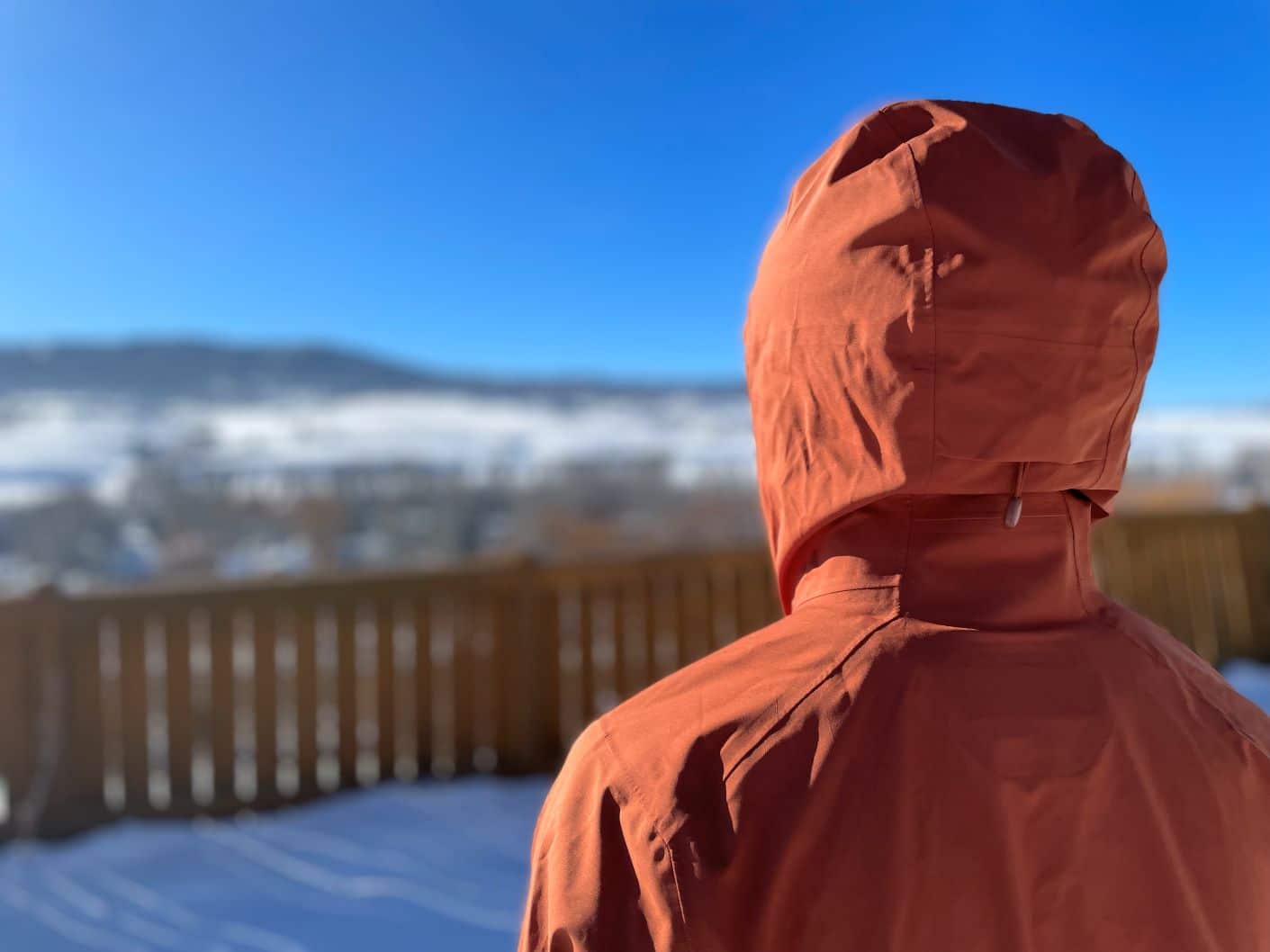 The hood of a Patagonia Stormstride backcountry ski jacket from the rear