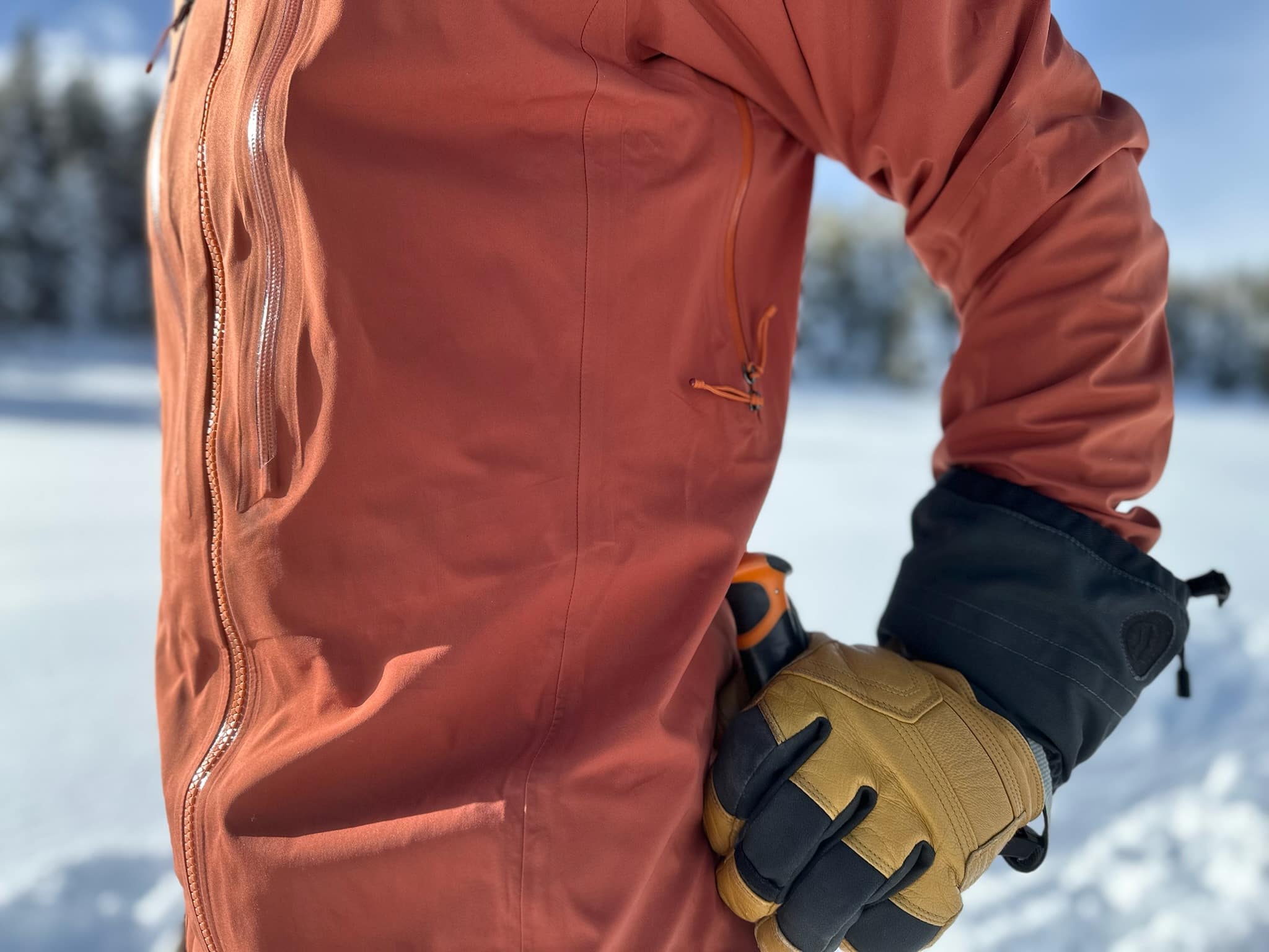 Showing the underarm zippered ventilation on the Patagonia Stormstride backcountry ski jacket.
