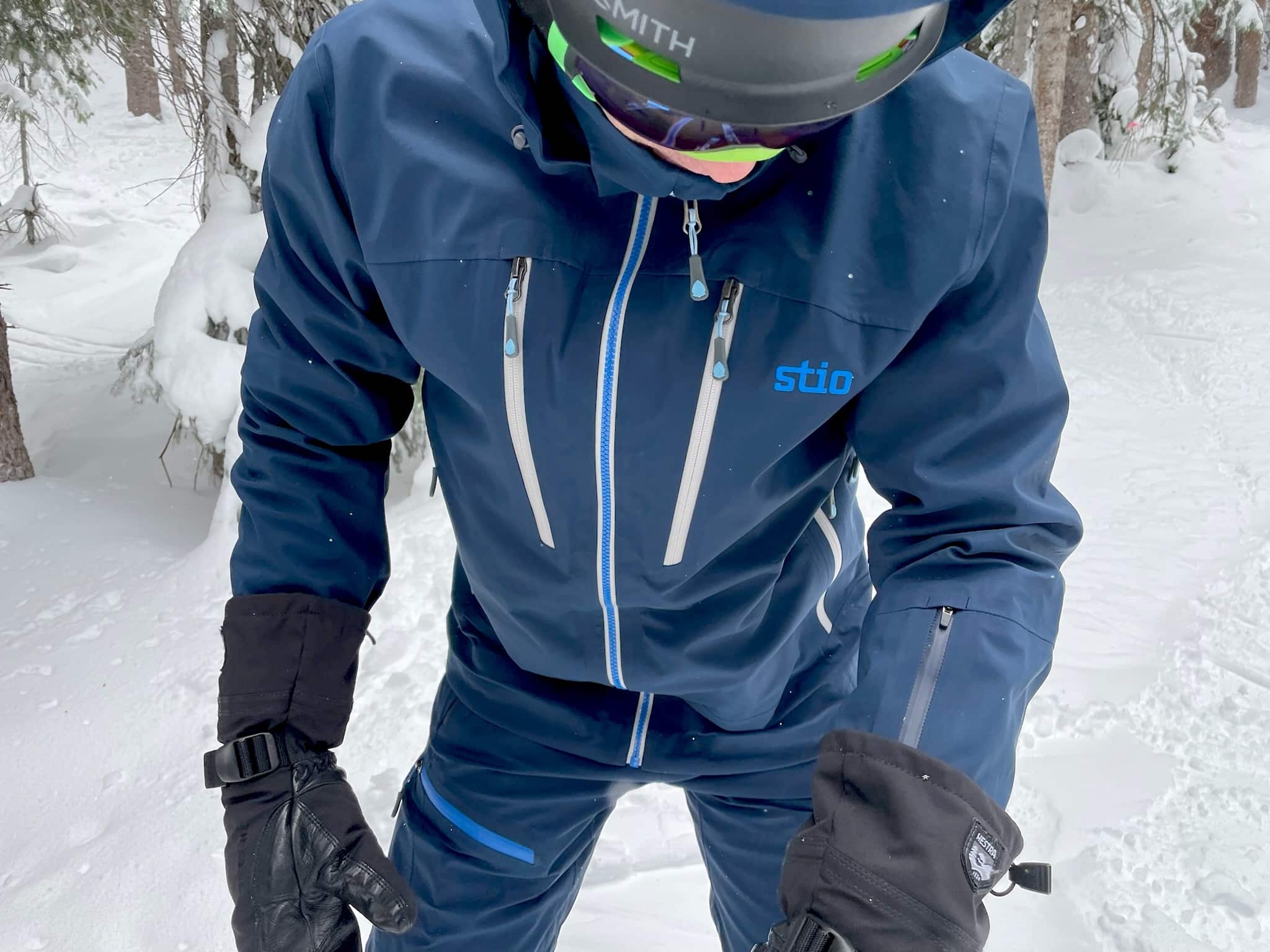 Snowboarder wearing the Stio Environ jacket.