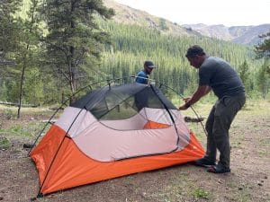 Pitching the REI Half Dome 2 tent on a backpacking trip.