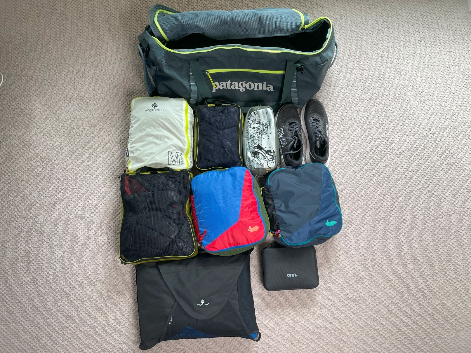 The Patagonia Black Hole Duffel 70L along with contents that can be packed inside.