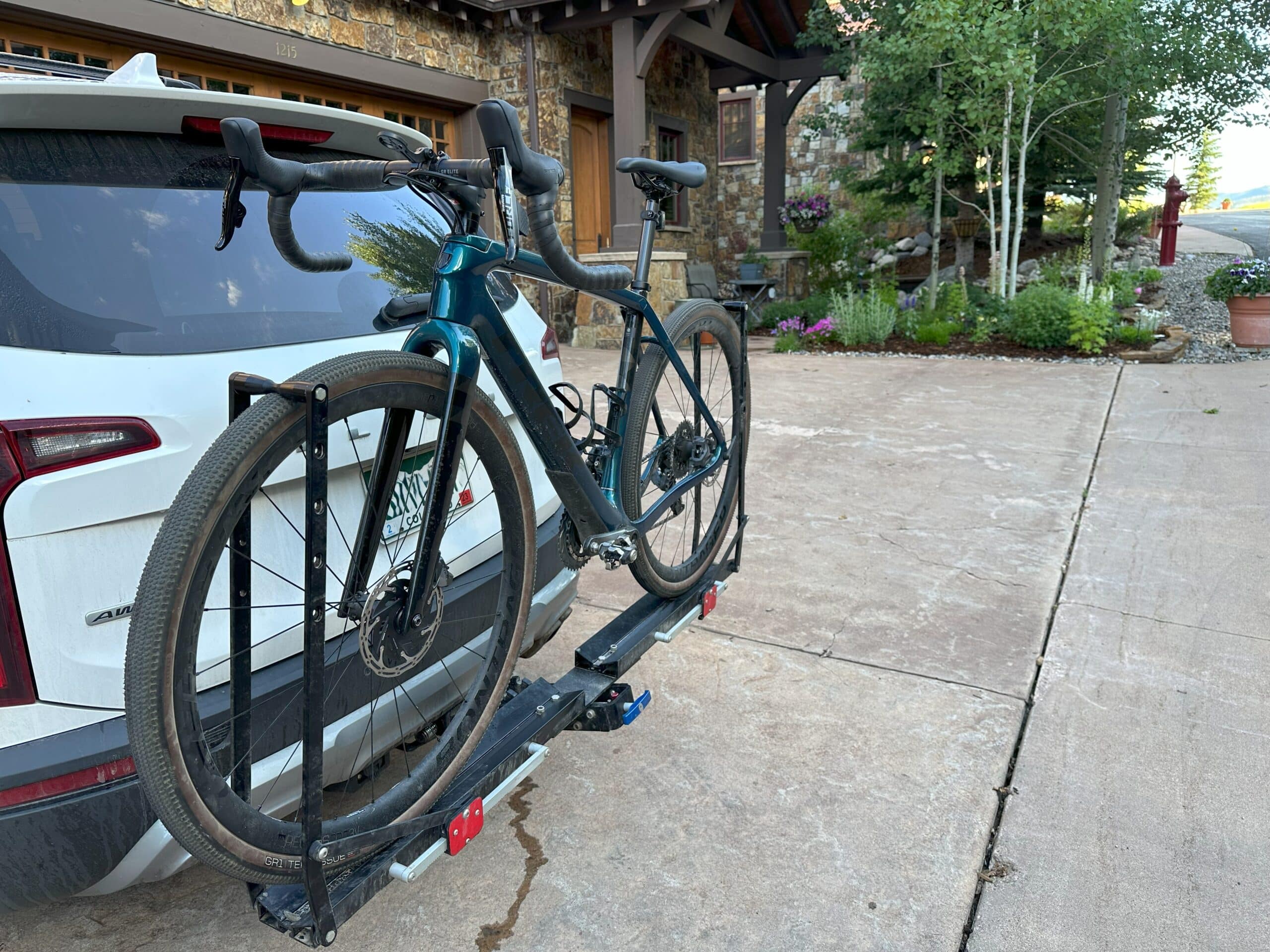 A bike attached to a 1UP USA Quik Rack bike hitch rack.