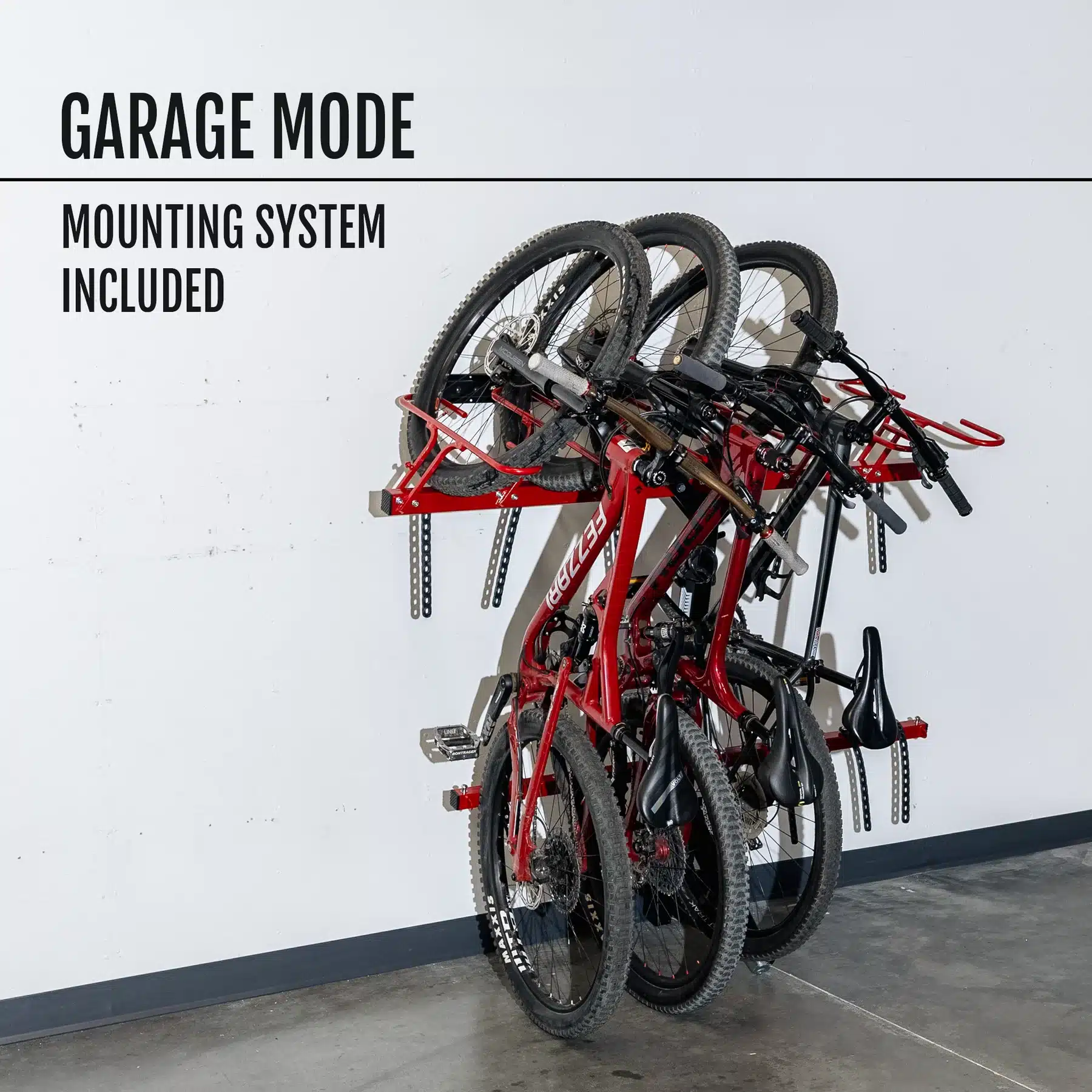 An image of the VelociRAX 6 vertical bike rack mounted on the wall of a garage.