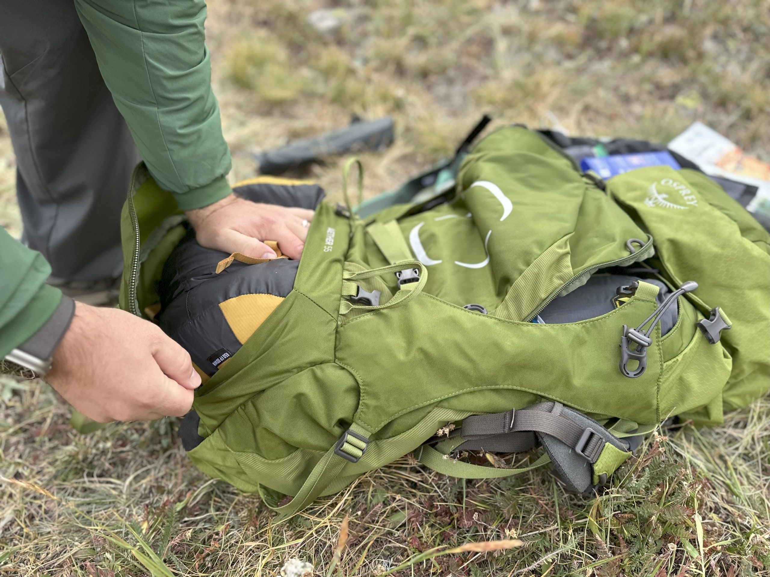 Image showing the sleeping bag compartment on an Osprey Aether 55 backpack.