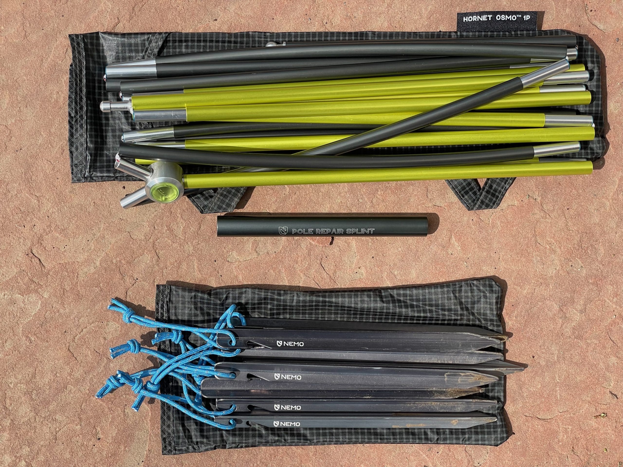 The poles and stakes for a Nemo Hornet OSMO 1 person ultralight backpacking tent.